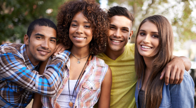 Four people youth aged smiling