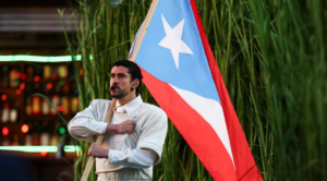 Bad Bunny holding the Puerto Rico flag