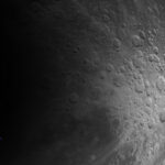 Artemis logo with moon in the background