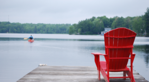 Peaceful lakeside setting representing employee recovery, workplace well-being, and the benefits of taking time away from work