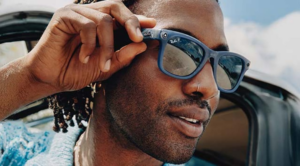 Person wearing AI-powered Ray-Ban Meta smart glasses featuring integrated camera and wearable artificial intelligence